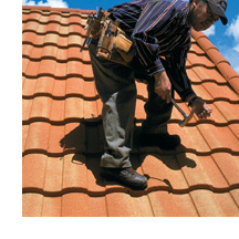 Man on Steel Tile Roof