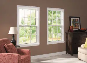 Vinyl Windows Minot ND A room having two sofas and white windows installed on a wall.