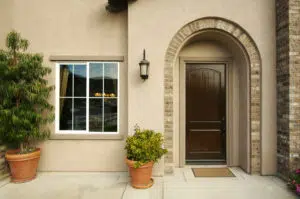Front Doors Fargo ND Customizable front door and window display with potted plants, showcasing a stylish entrance for homes in Fargo, ND.
