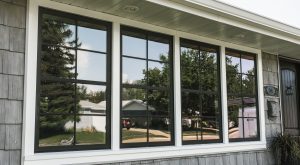 Energy efficient windows with white trim installed on home