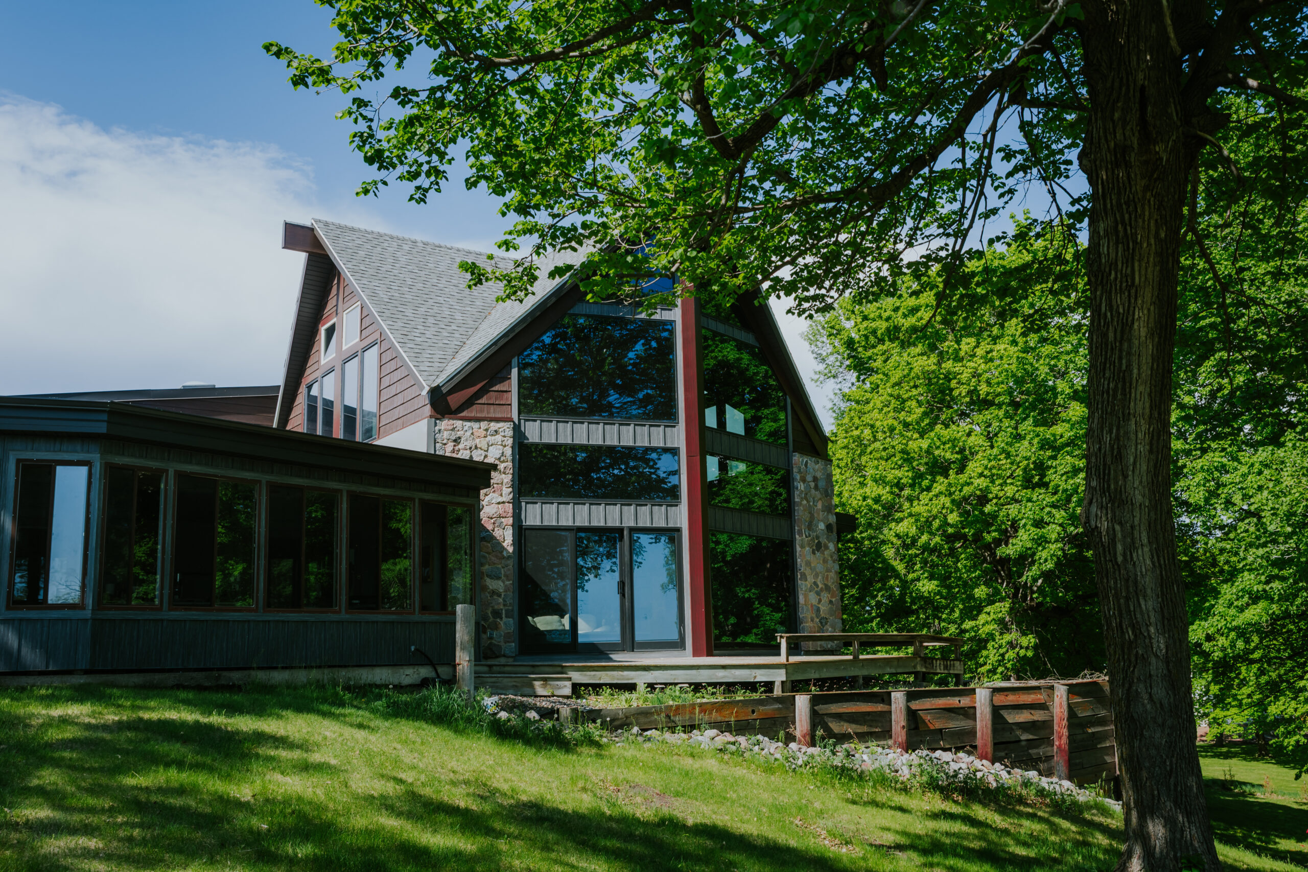 Custom window wall, sunroom and patio doors on a North Dakota home
